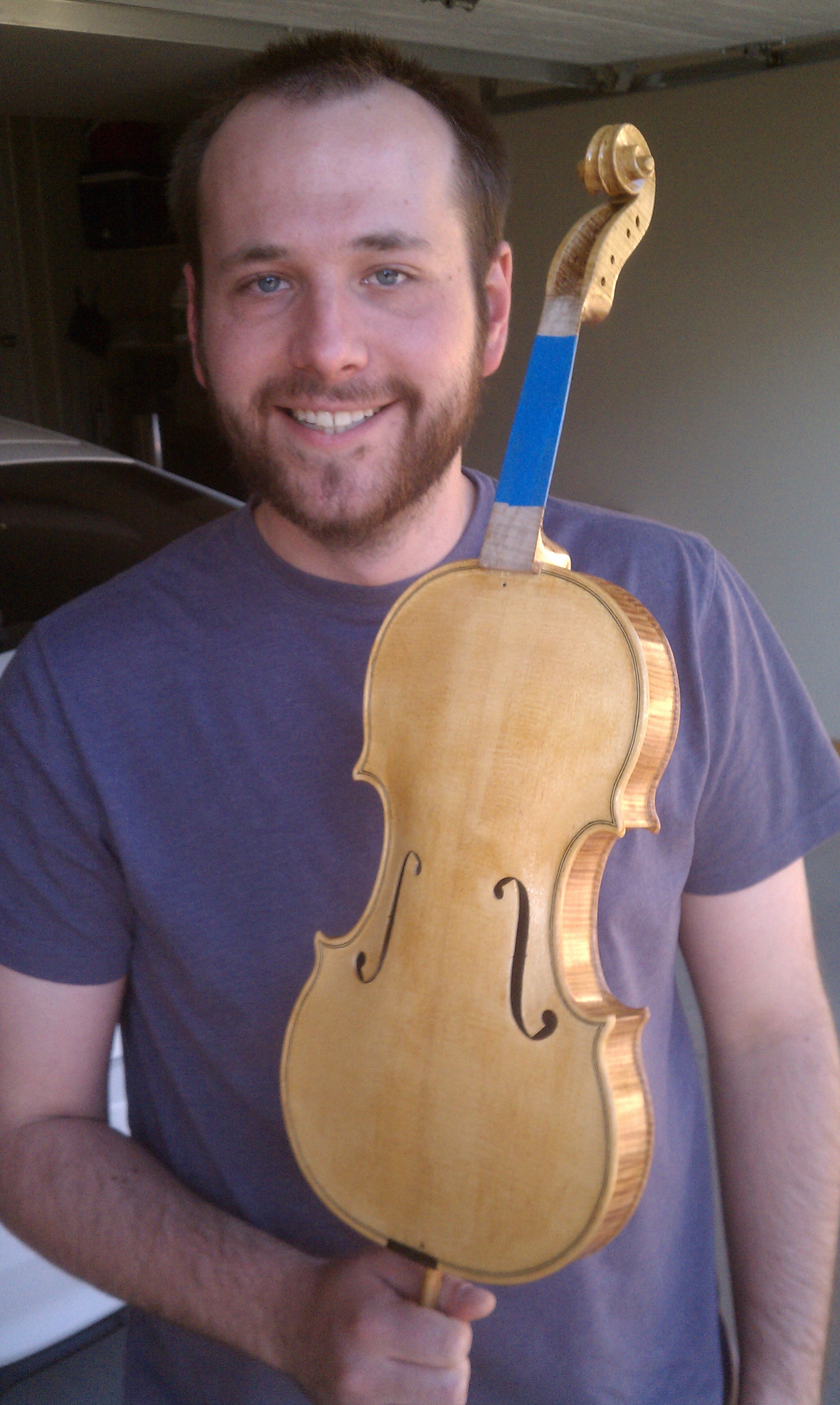 Sam in the workshop, early in his instrument-making years